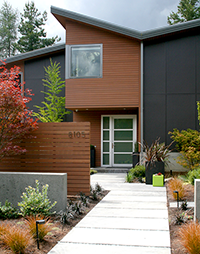 A sense of arrival is elongated and accentuated with a slight jog in the entry pathway. Containers are from Ragen & Associates. A sense of arrival is elongated and accentuated with a slight jog in the entry pathway. Containers are from Ragen & Associates.