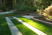 A horse shoe court by Nyce Gardens engages the family